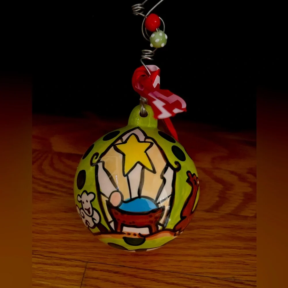 Glory Haus Christmas Ornament Baby Jesus In Manger Painted Porcelain Ball
